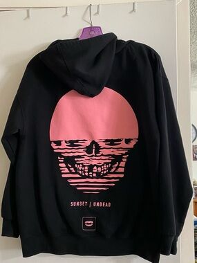 Chomp Sunset Undead Men's Black Hoodie with Pink Skull Graphic